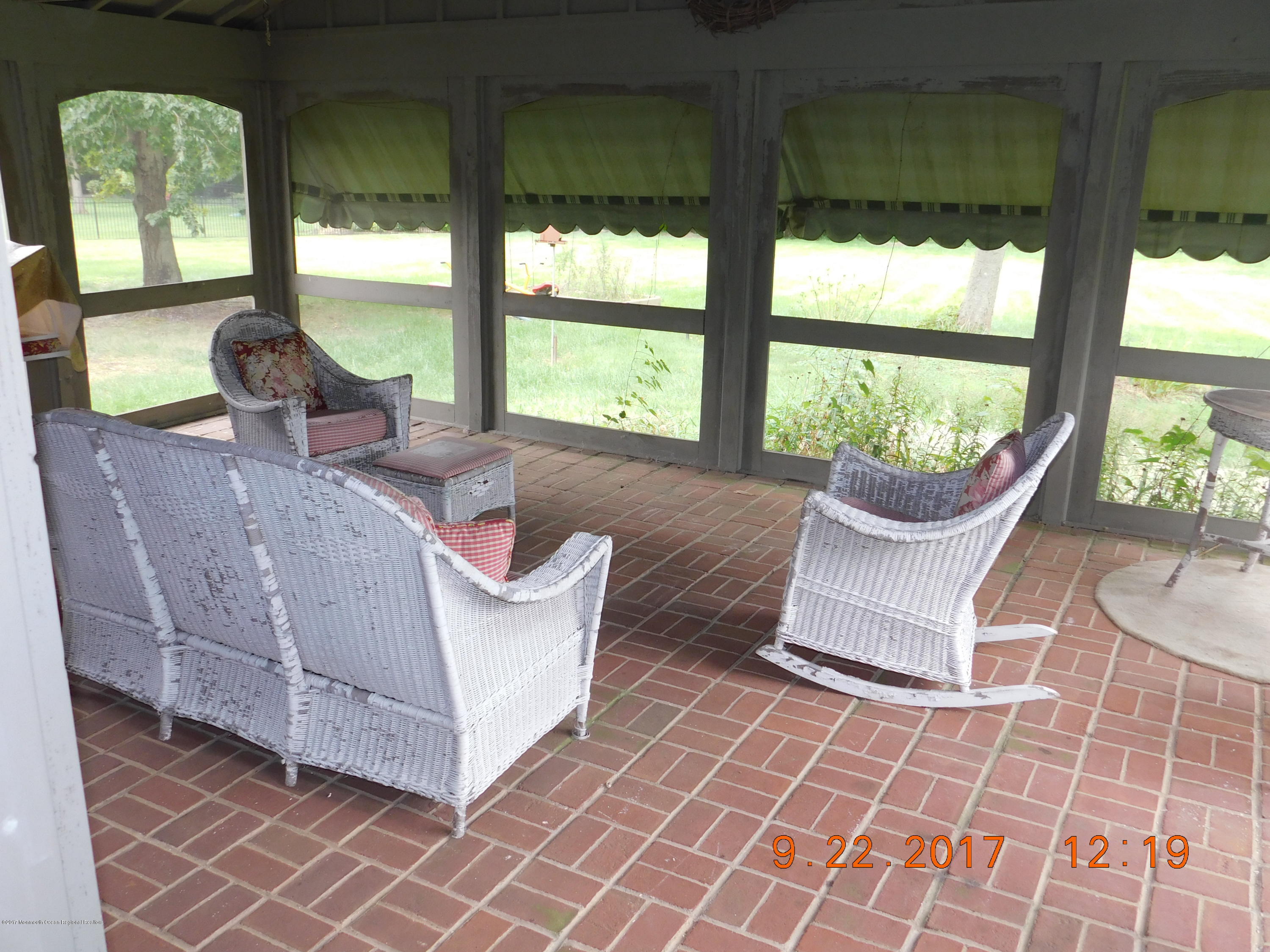 68 Stavola Road Middletown, NJ 07748 - Photo 38 of 49 a living room with furniture and a large window