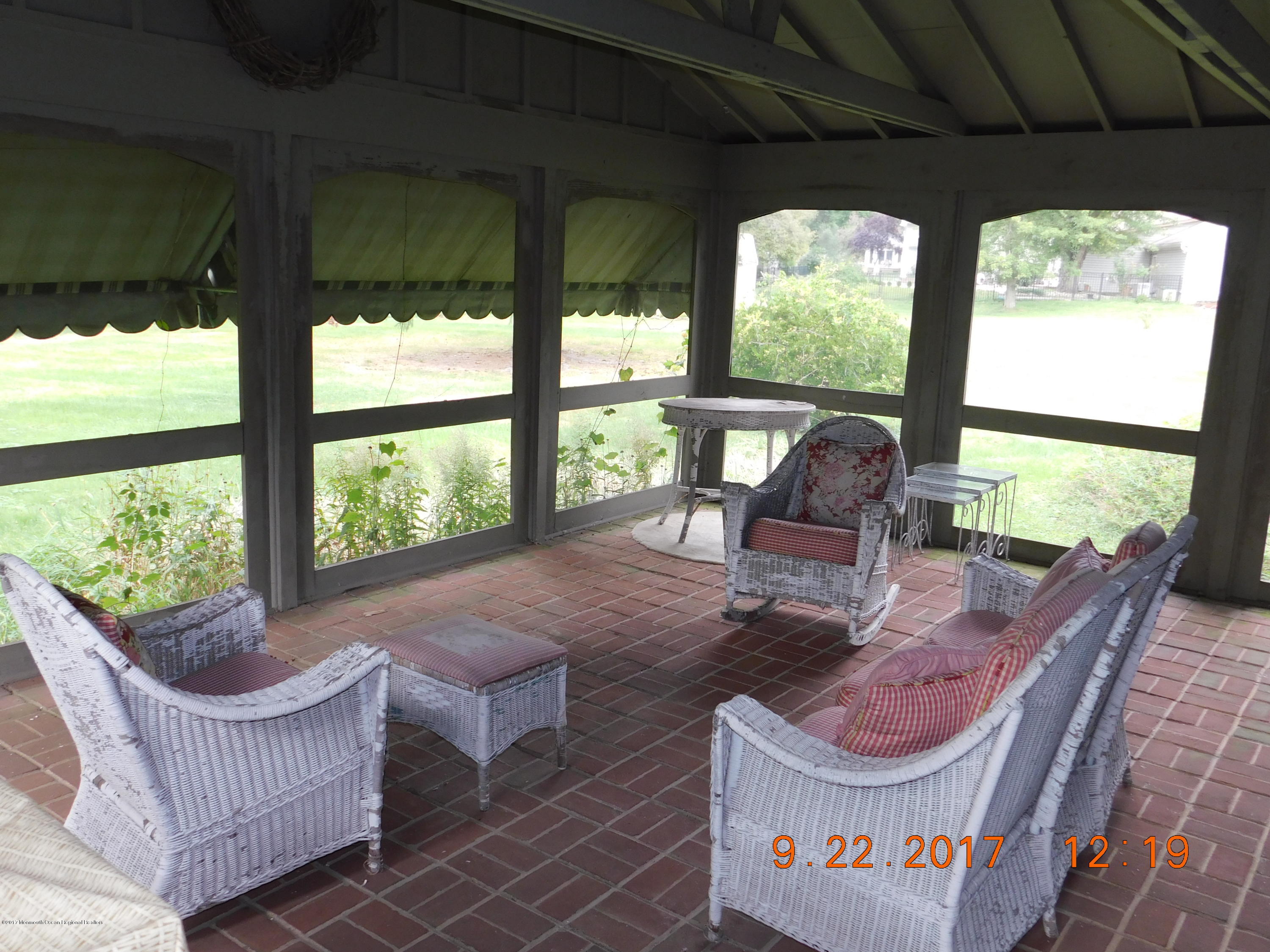68 Stavola Road Middletown, NJ 07748 - Photo 39 of 49 a living room with furniture and a large window