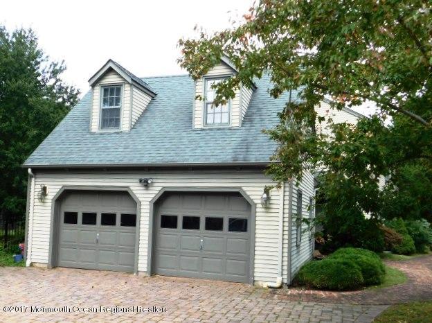 68 Stavola Road Middletown, NJ 07748 - Photo 40 of 49 a front view of a house with a garden