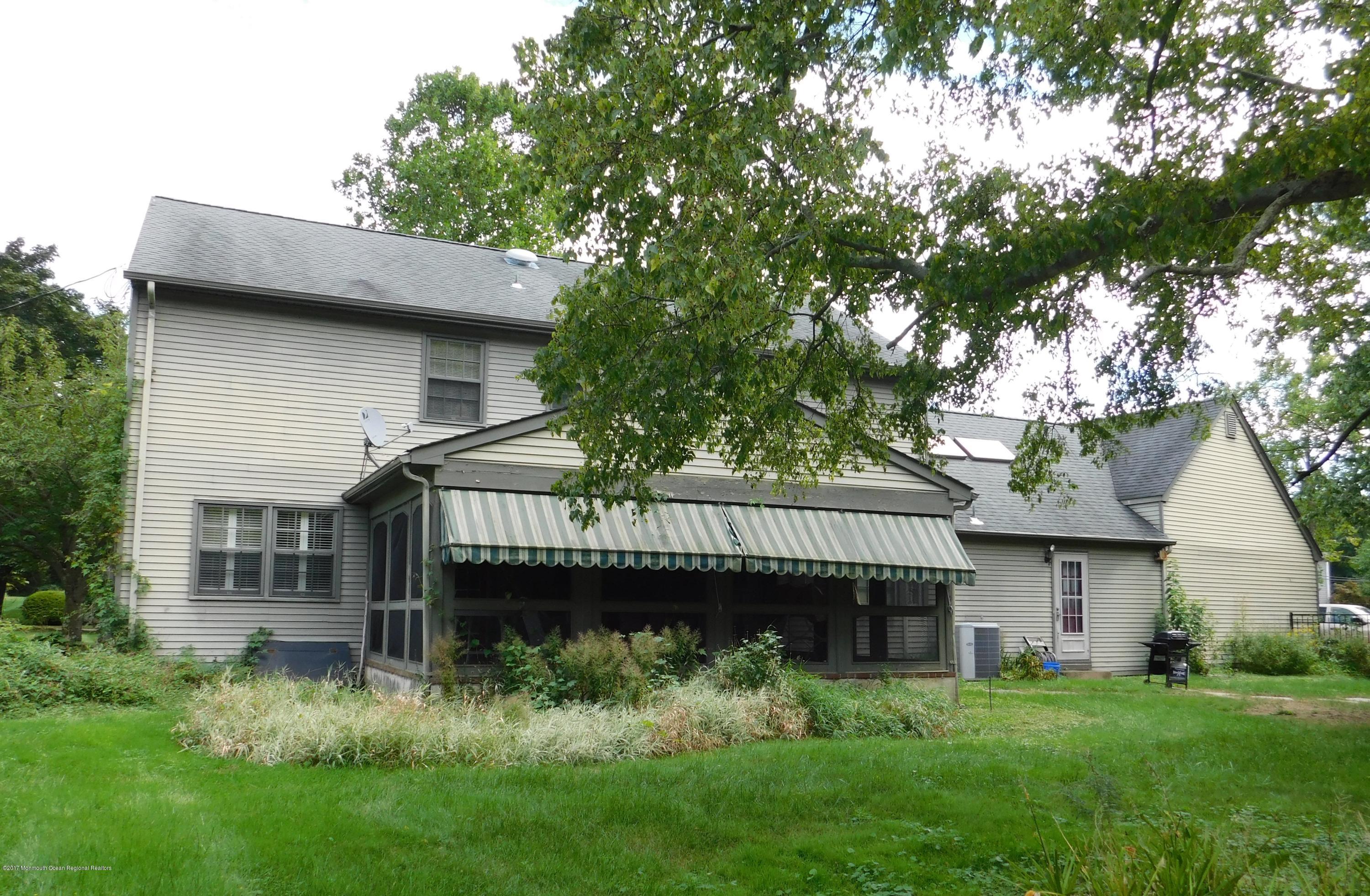 68 Stavola Road Middletown, NJ 07748 - Photo 45 of 49 a view of a house with a balcony