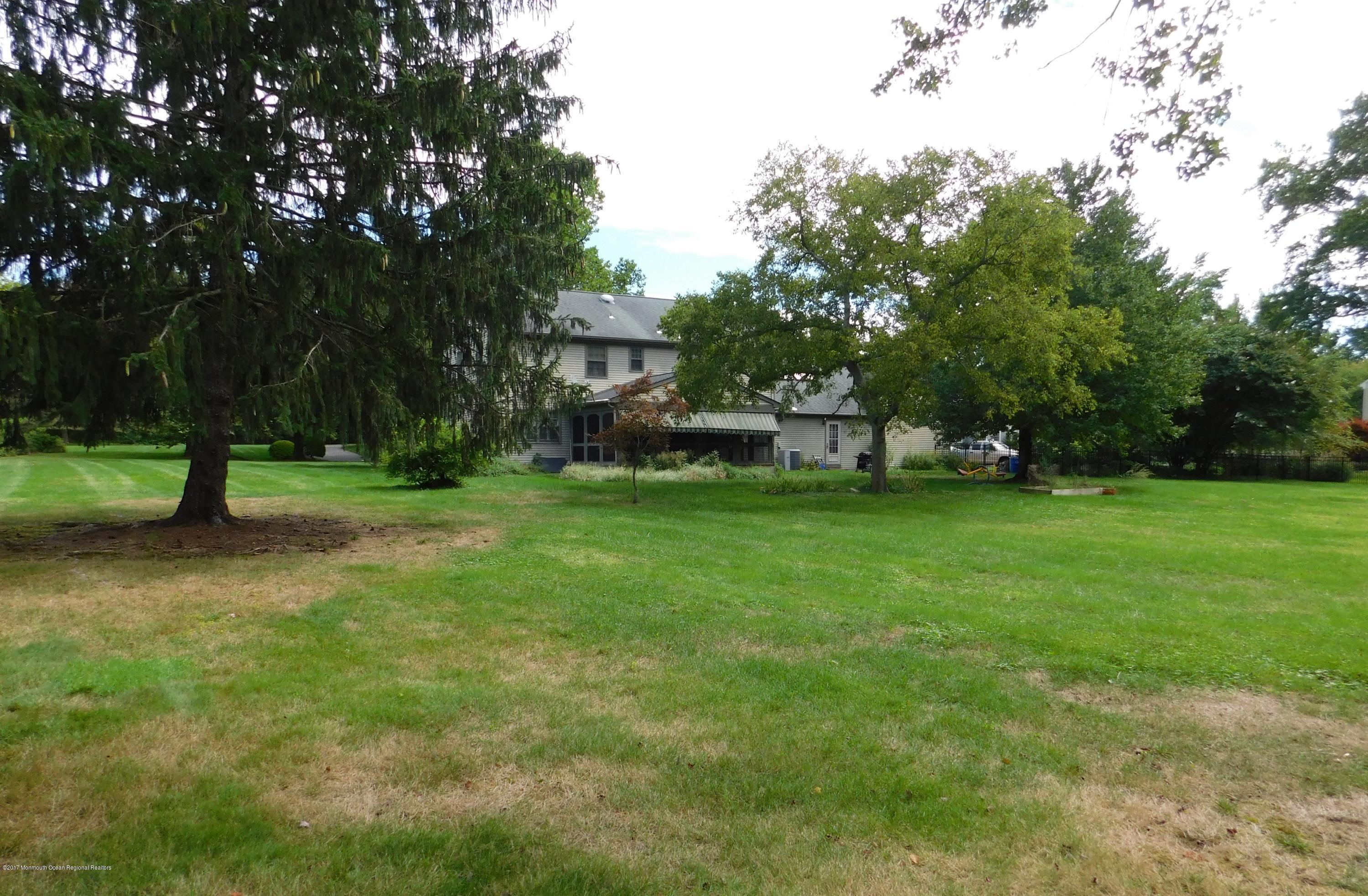 68 Stavola Road Middletown, NJ 07748 - Photo 47 of 49 a view of field with trees in the background