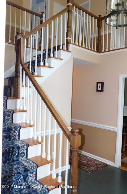 68 Stavola Road Middletown, NJ 07748 - Photo 5 of 49 a view of entryway with wooden floor and stairs