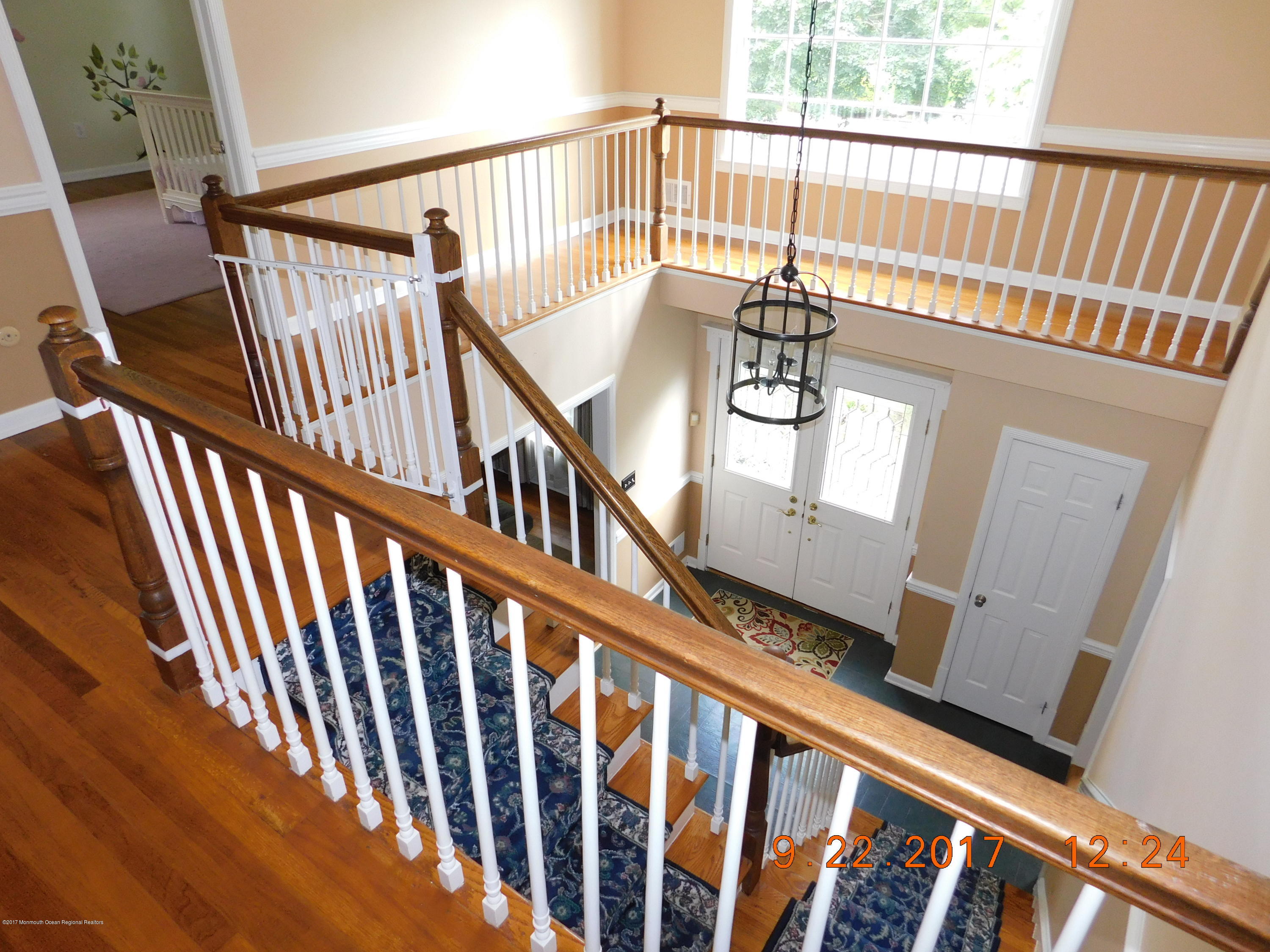 68 Stavola Road Middletown, NJ 07748 - Photo 7 of 49 a view of staircase with railing and a large window