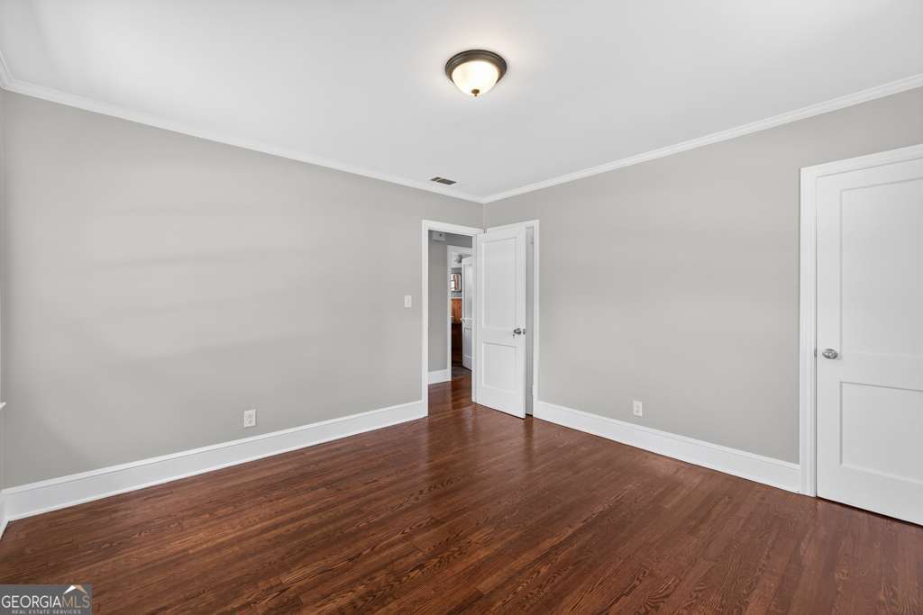 150 Jefferson River Road Athens, GA 30607 - Photo 20 of 76 a view of an empty room with wooden floor