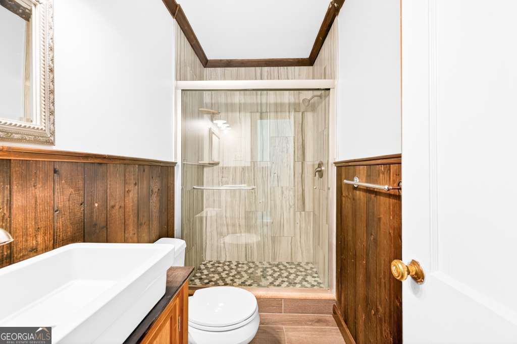 150 Jefferson River Road Athens, GA 30607 - Photo 29 of 76 a bathroom with a toilet a sink and shower