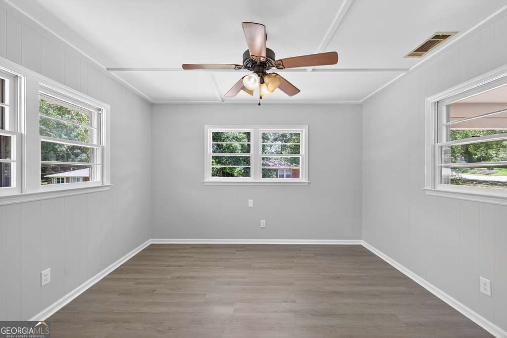 150 Jefferson River Road Athens, GA 30607 - Photo 34 of 76 a view of an empty room with wooden floor and a window