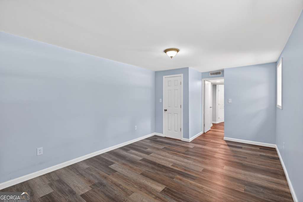 150 Jefferson River Road Athens, GA 30607 - Photo 48 of 76 a view of an empty room with wooden floor
