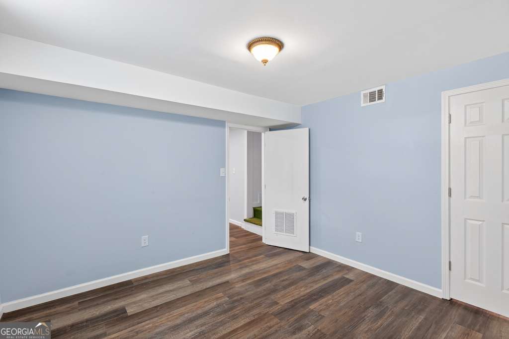 150 Jefferson River Road Athens, GA 30607 - Photo 50 of 76 a view of an empty room with wooden floor