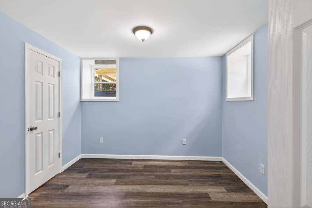 150 Jefferson River Road Athens, GA 30607 - Photo 51 of 76 a view of an empty room with wooden floor and a window