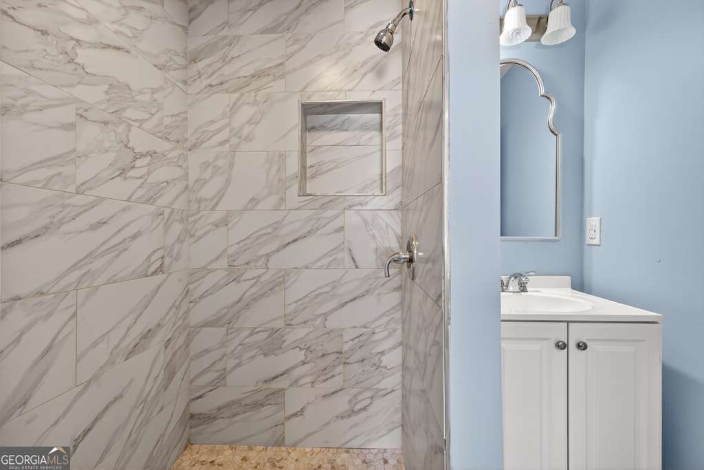 150 Jefferson River Road Athens, GA 30607 - Photo 54 of 76 a bathroom with a sink and mirror