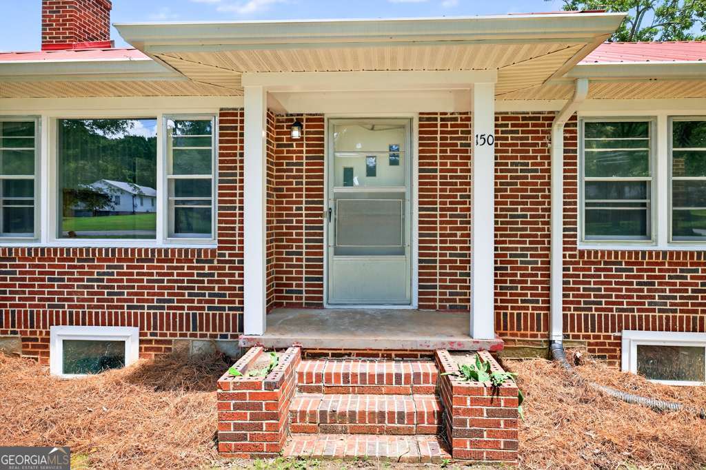 150 Jefferson River Road Athens, GA 30607 - Photo 8 of 76 a view of a brick building with many windows