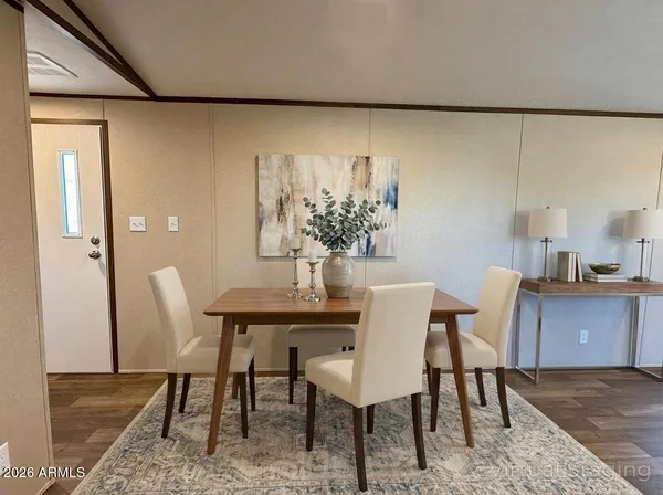 a view of a dining room with furniture