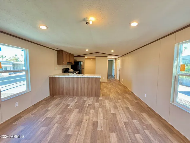 a view of a livingroom with wooden floor