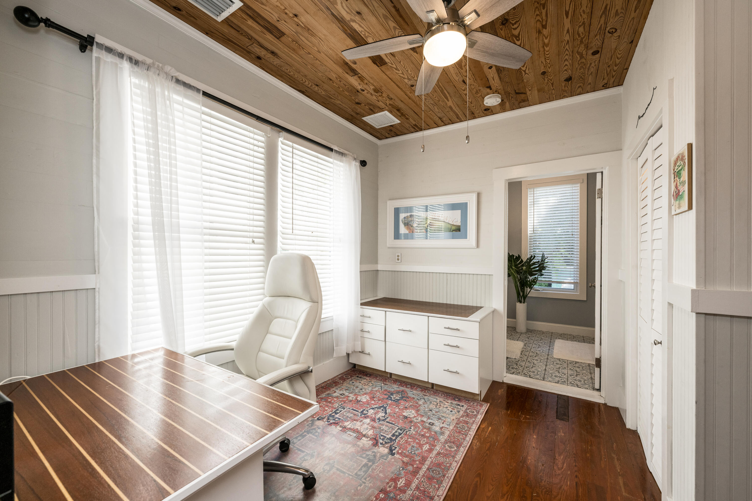 1416 Catherine Street Key West, FL 33040 - Photo 14 of 53 a workspace with wooden floor and windows