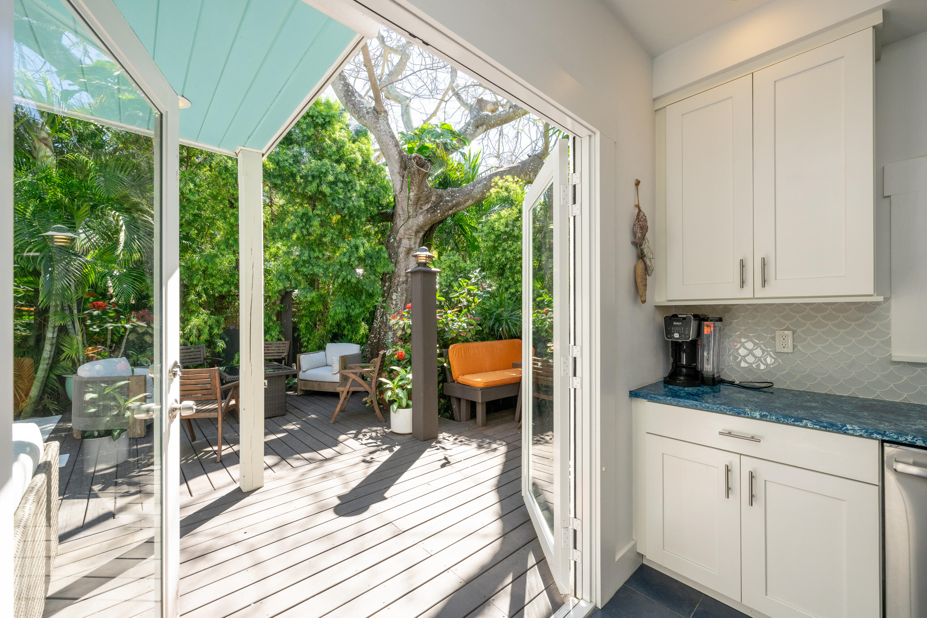 1416 Catherine Street Key West, FL 33040 - Photo 21 of 53 a kitchen view with a large window and sitting area