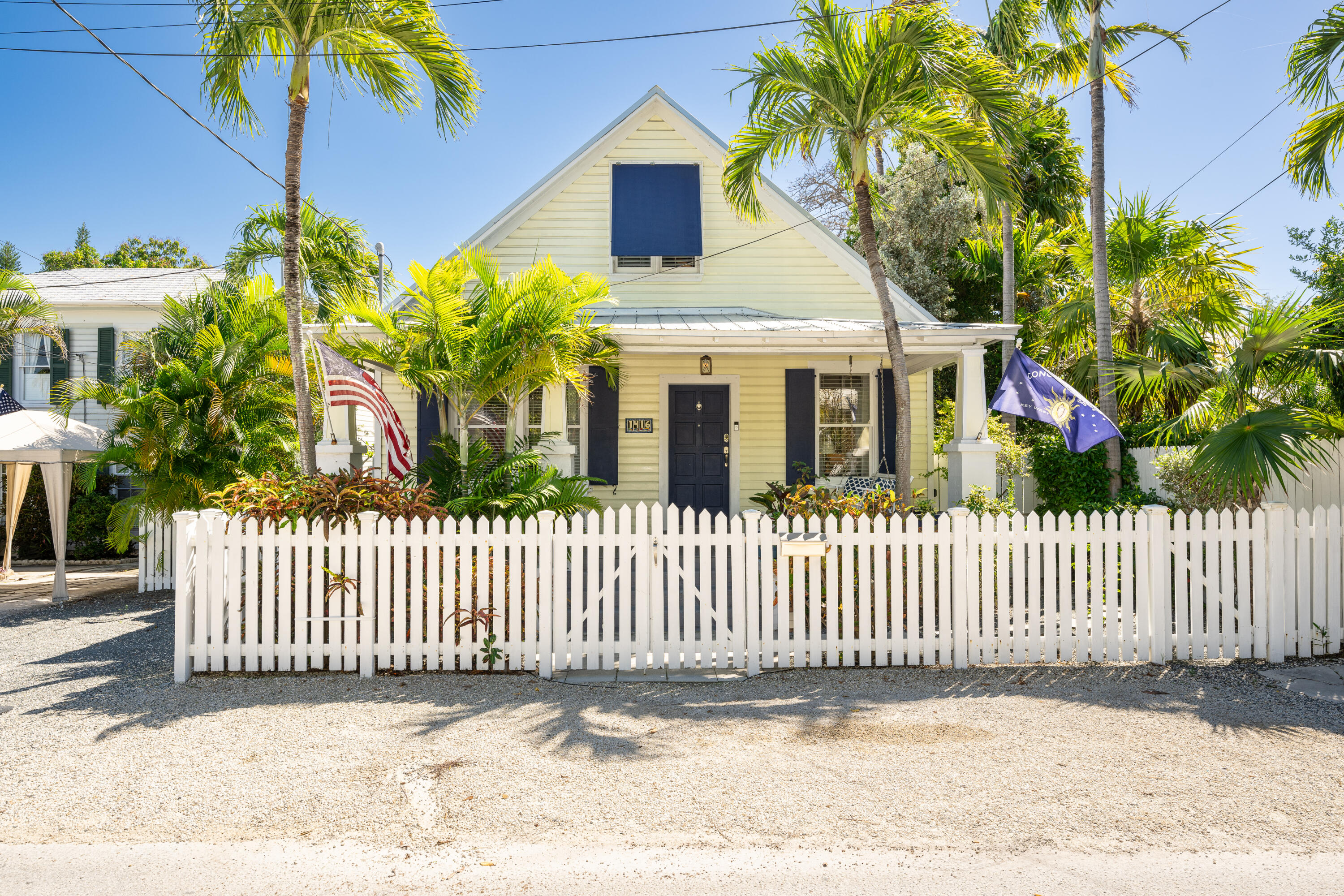 1416 Catherine Street Key West, FL 33040 - Photo 28 of 53 a front view of a house with a garden