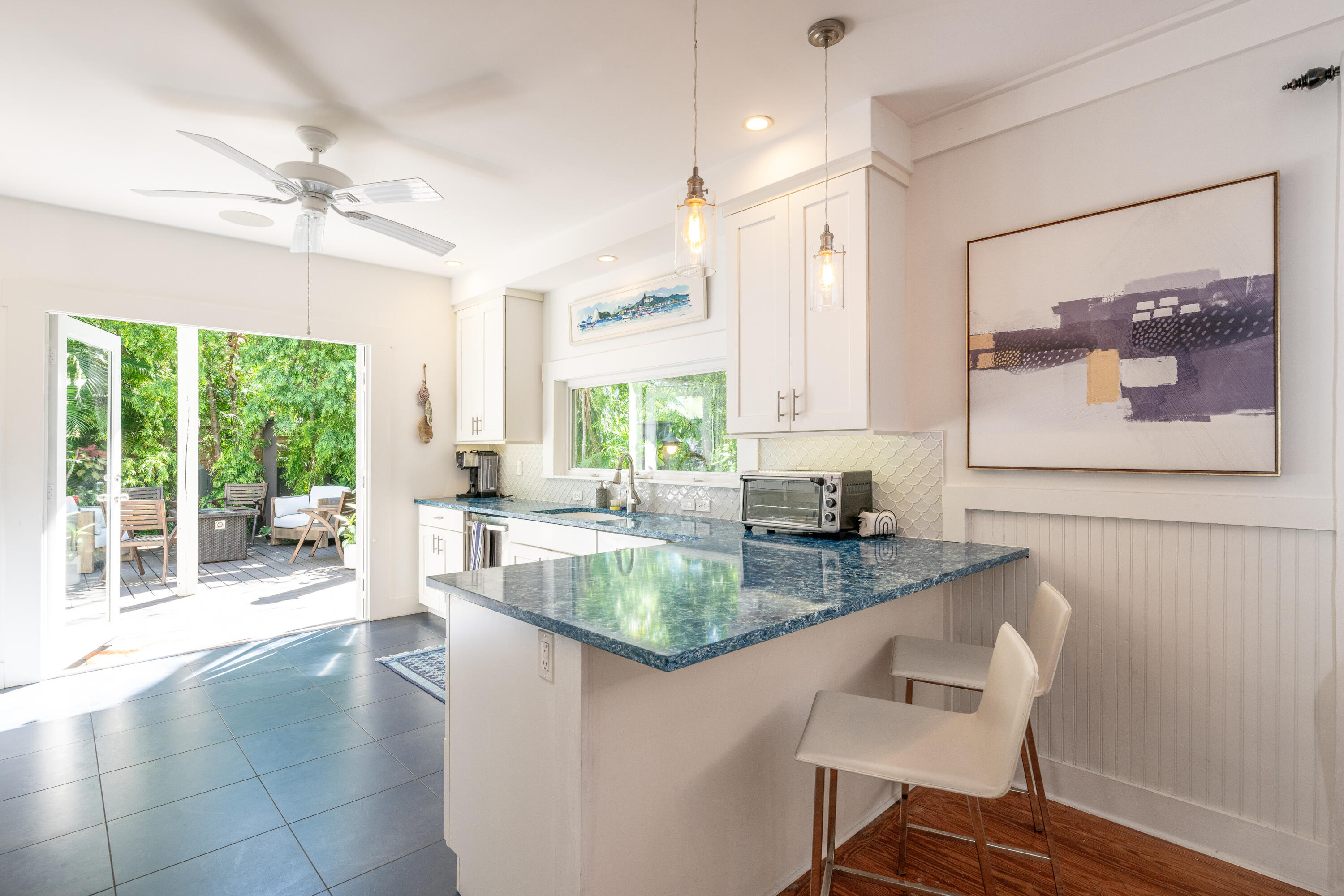 1416 Catherine Street Key West, FL 33040 - Photo 4 of 53 a large white kitchen with a large window