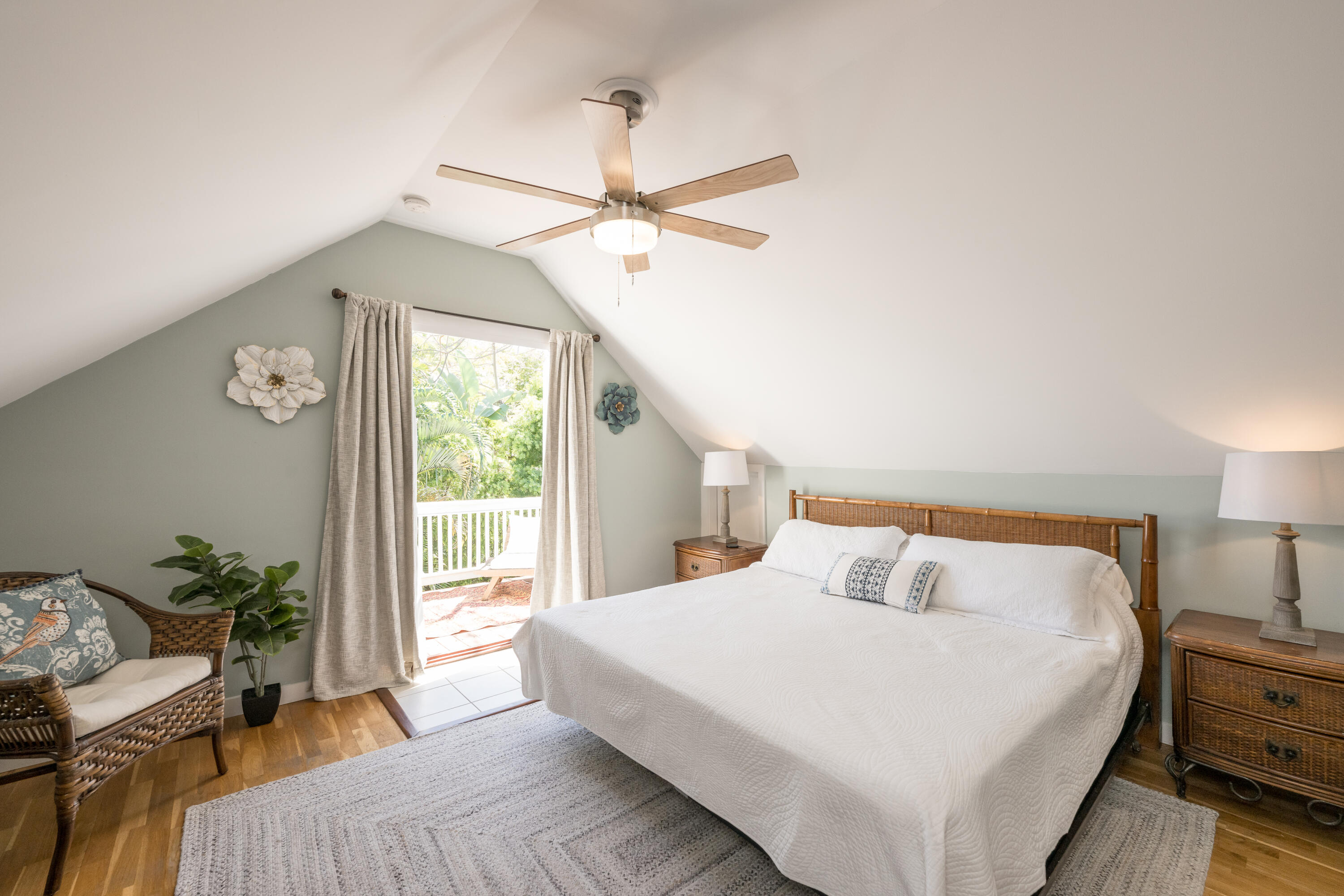 1416 Catherine Street Key West, FL 33040 - Photo 43 of 53 a bedroom with a large bed and a chandelier