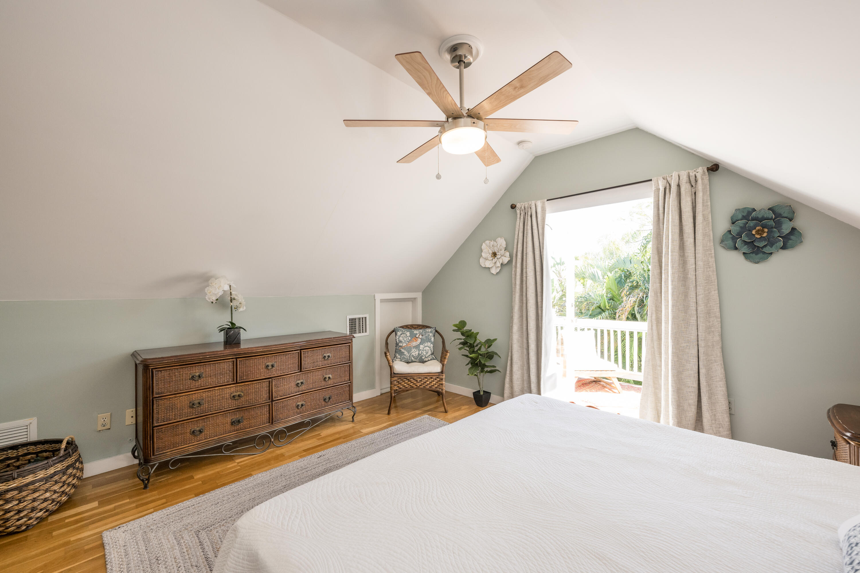 1416 Catherine Street Key West, FL 33040 - Photo 45 of 53 a bedroom with a bed and a chandelier