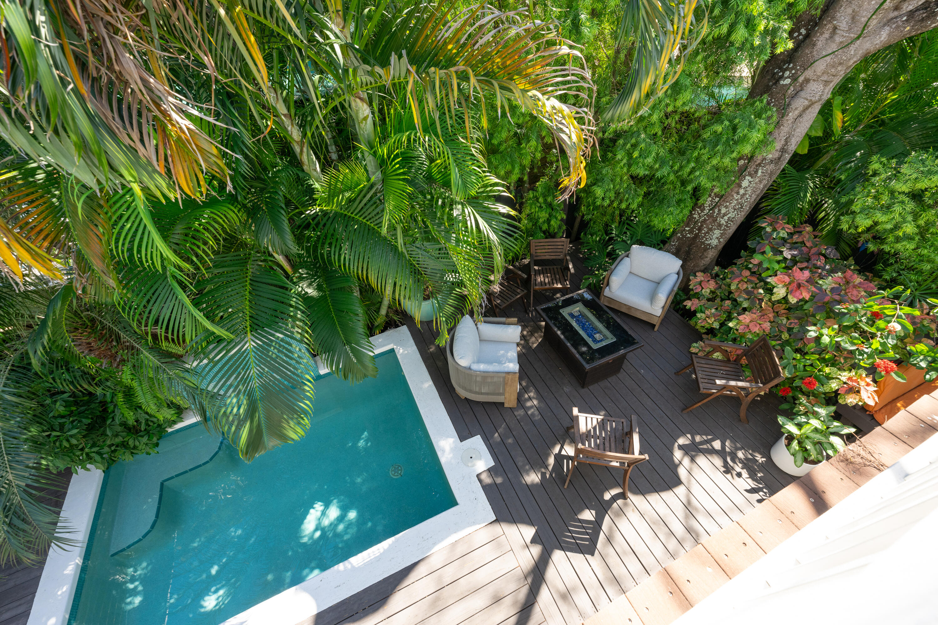 1416 Catherine Street Key West, FL 33040 - Photo 48 of 53 a view of balcony with chairs and wooden fence
