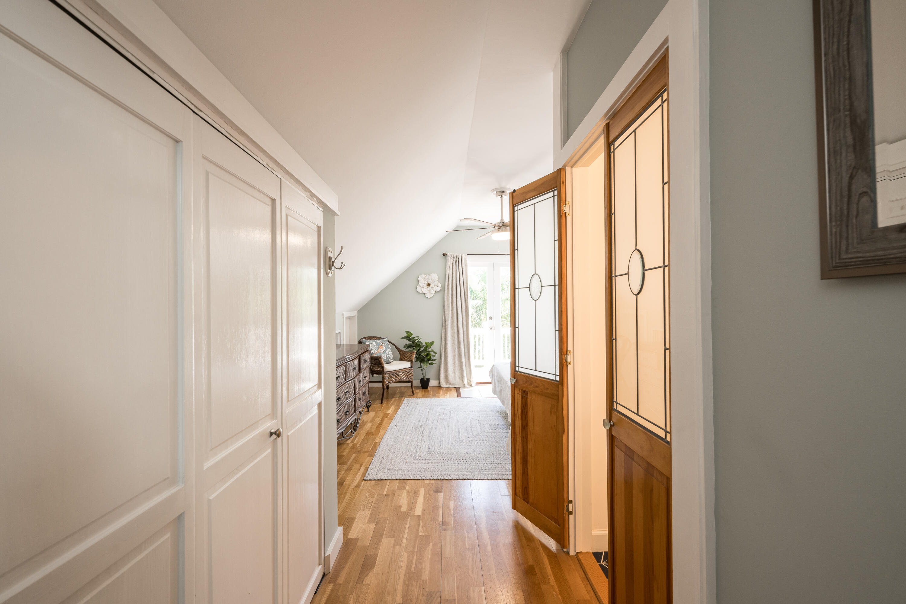 1416 Catherine Street Key West, FL 33040 - Photo 51 of 53 a view of a hallway with wooden floor and furniture