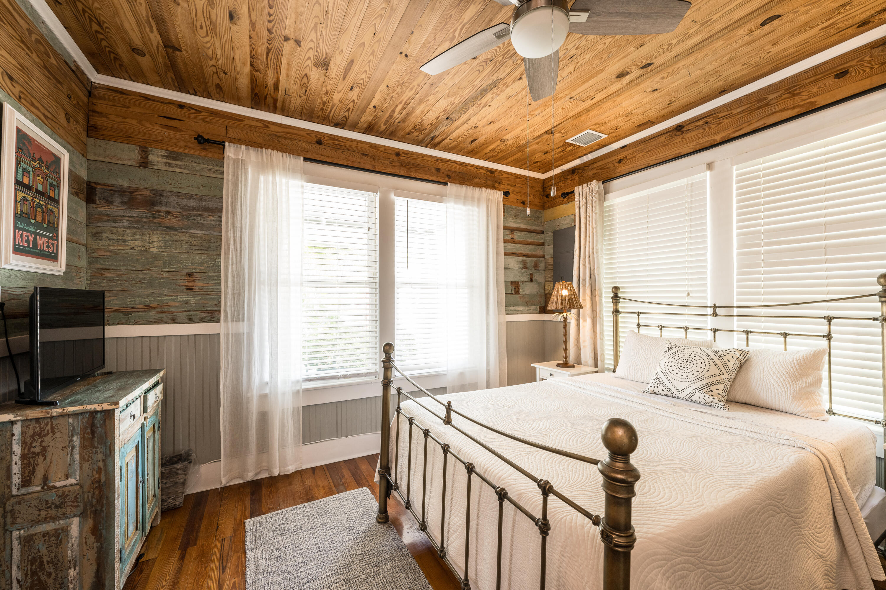 1416 Catherine Street Key West, FL 33040 - Photo 9 of 53 a bedroom with a bed and a tv