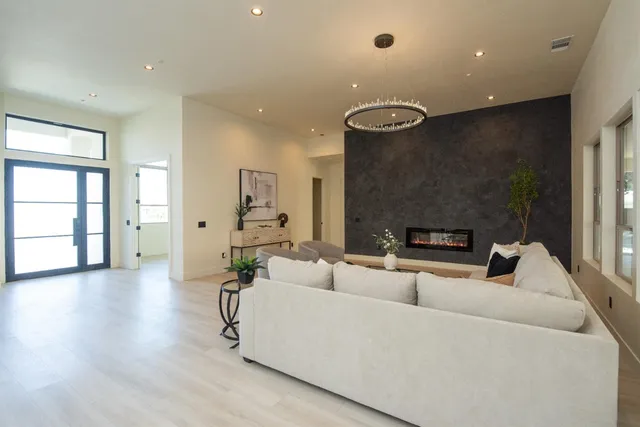 a stove top oven sitting inside of a kitchen