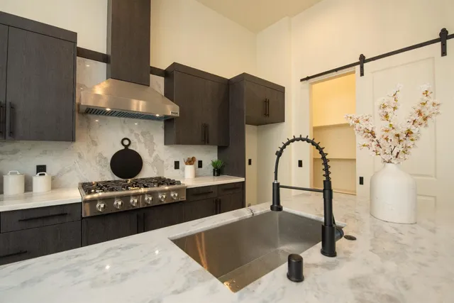 a view of a dining room with furniture and window