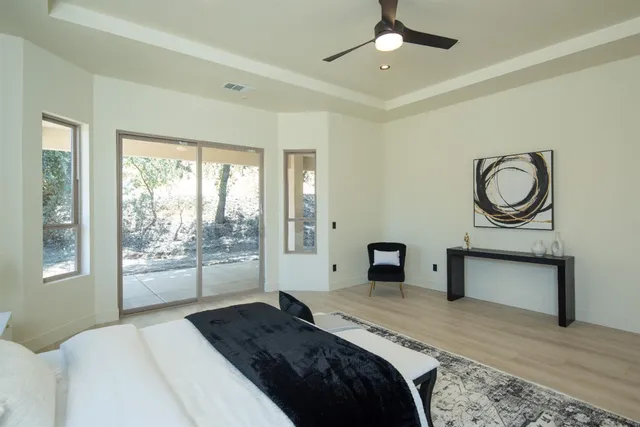 a bathroom with a shower and toilet