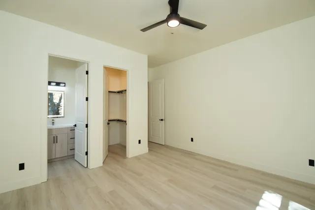 a view of an empty walk in closet