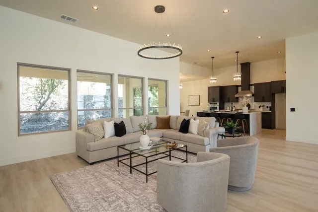 a living room with a couch and a table