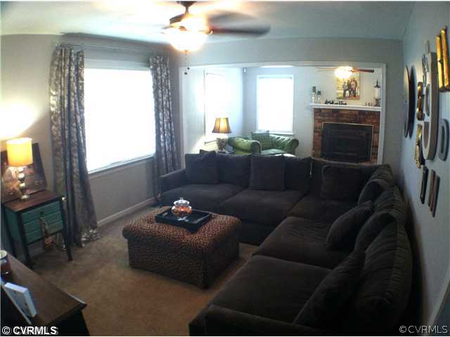 10430 Ambridge Road Chesterfield, VA 23832 - Photo 17 of 18 a living room with furniture and a flat screen tv