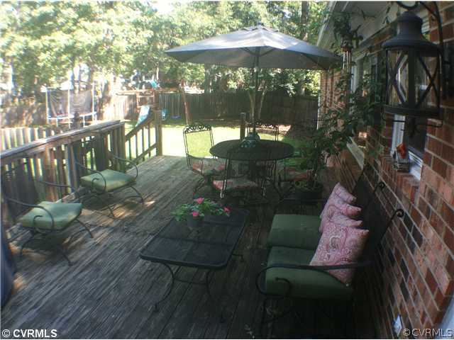 10430 Ambridge Road Chesterfield, VA 23832 - Photo 6 of 18 a view of a porch with furniture and wooden floor