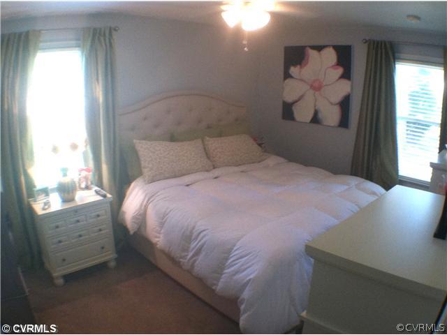 10430 Ambridge Road Chesterfield, VA 23832 - Photo 9 of 18 a bedroom with a bed and a window