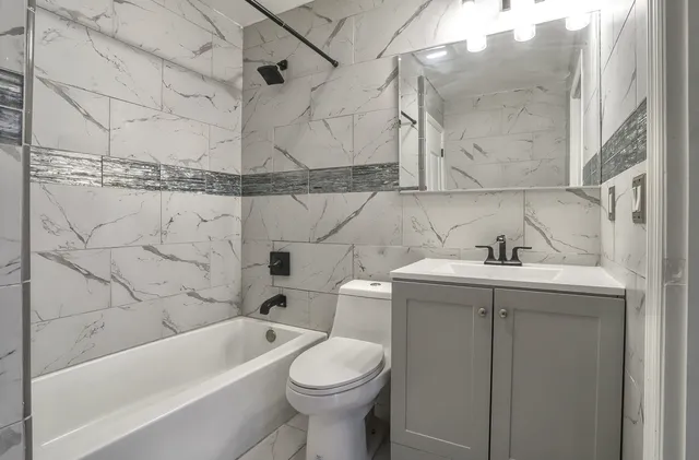 a bathroom with a sink and toilet