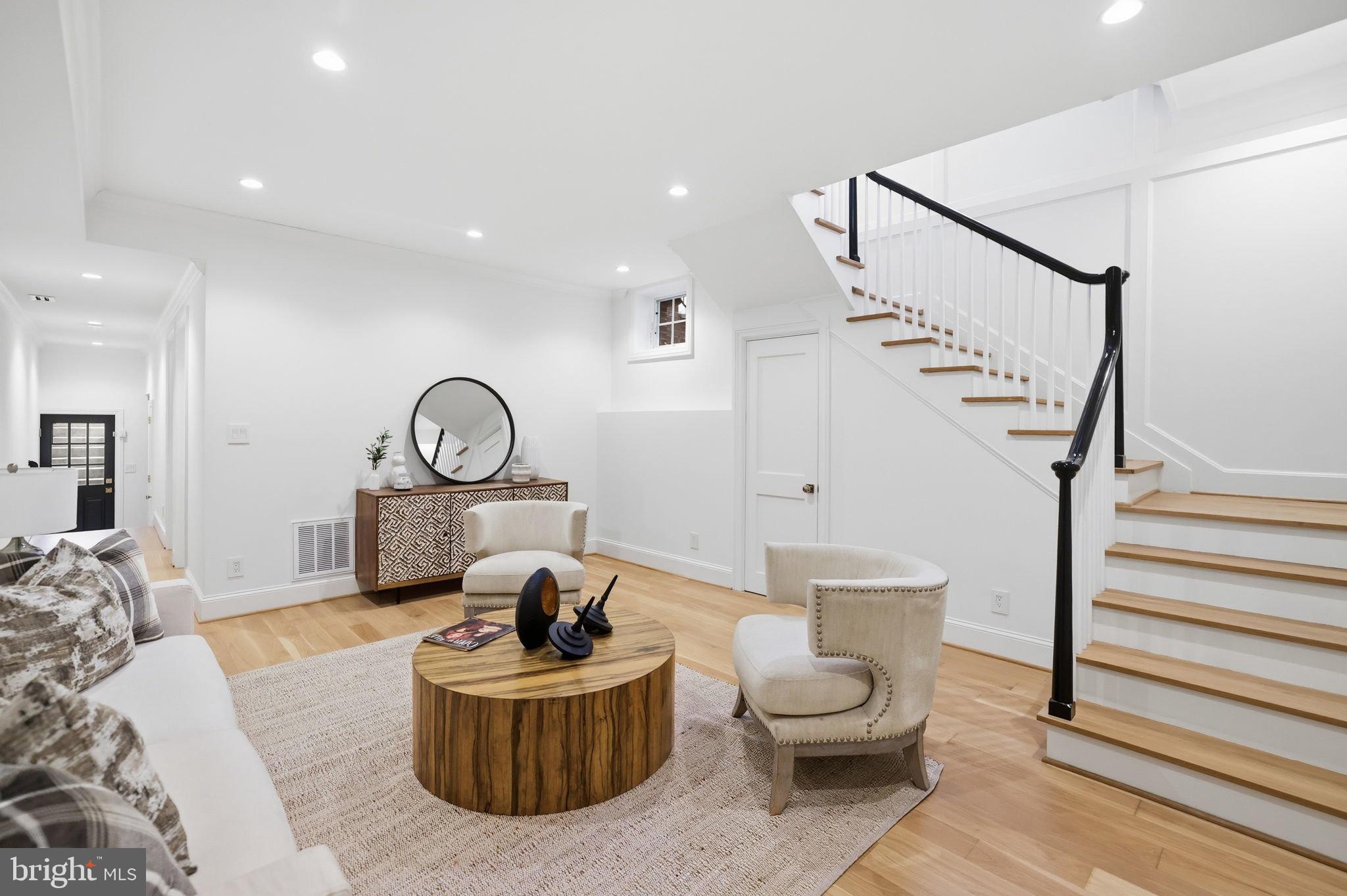 3418 Reservoir Road Northwest Washington, DC 20007 - Photo 25 of 33 a living room with furniture and a large window
