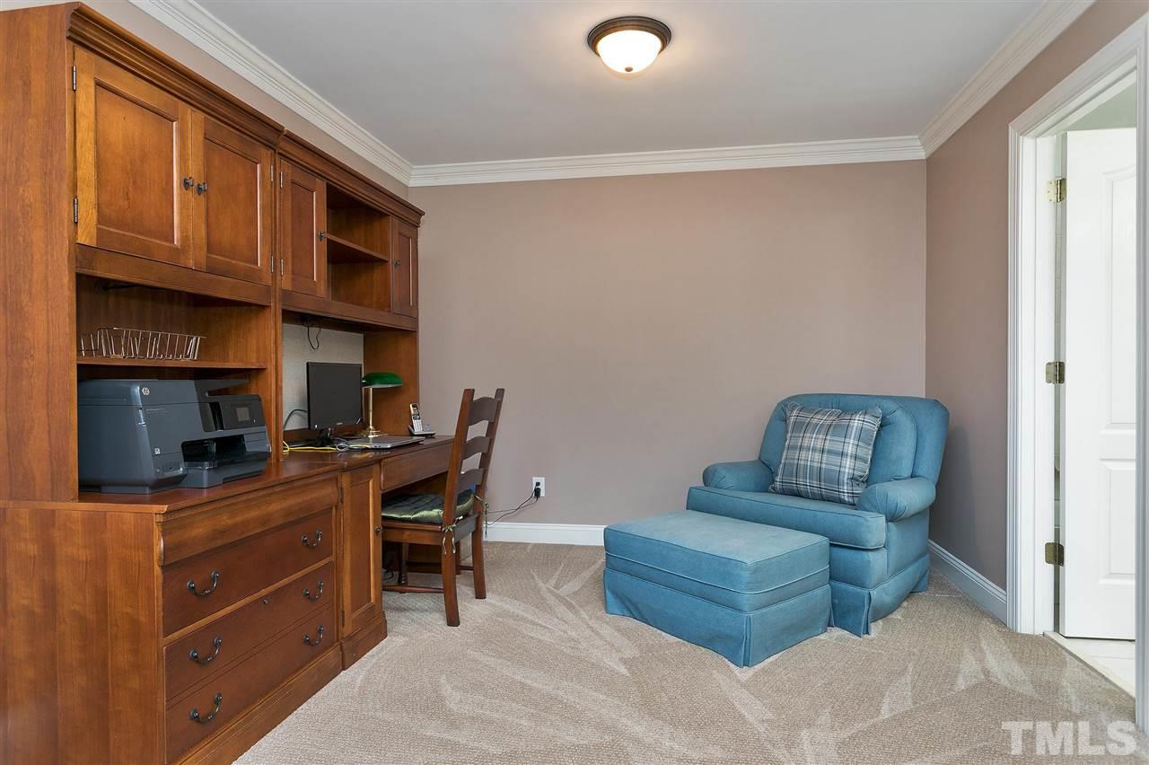8216 Lloyd Allyns Way Raleigh, NC 27615 - Photo 14 of 30 Spacious loft area currently utilized as a home office.