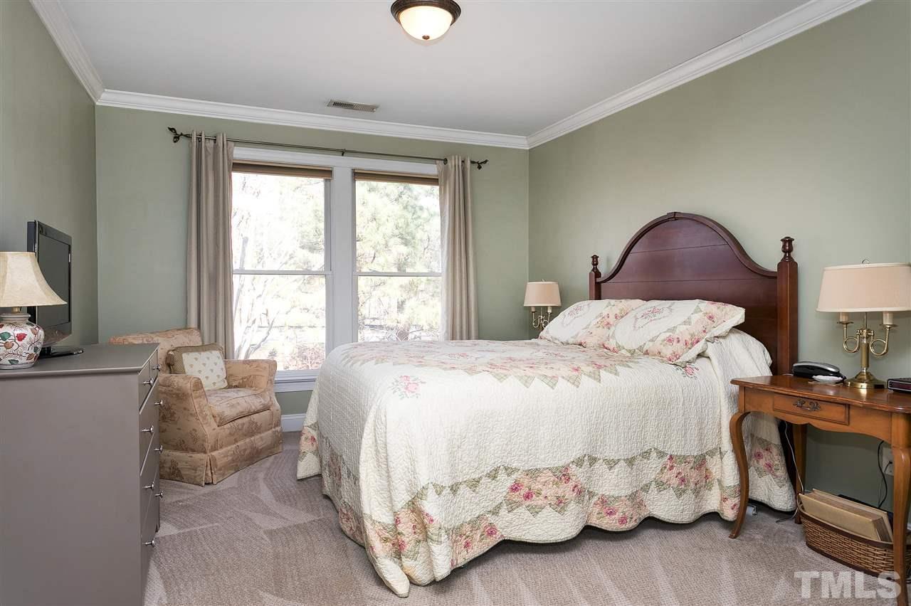 8216 Lloyd Allyns Way Raleigh, NC 27615 - Photo 15 of 30 Second floor bedroom with en-suite bath could be a second master or just a great, private space for guests.