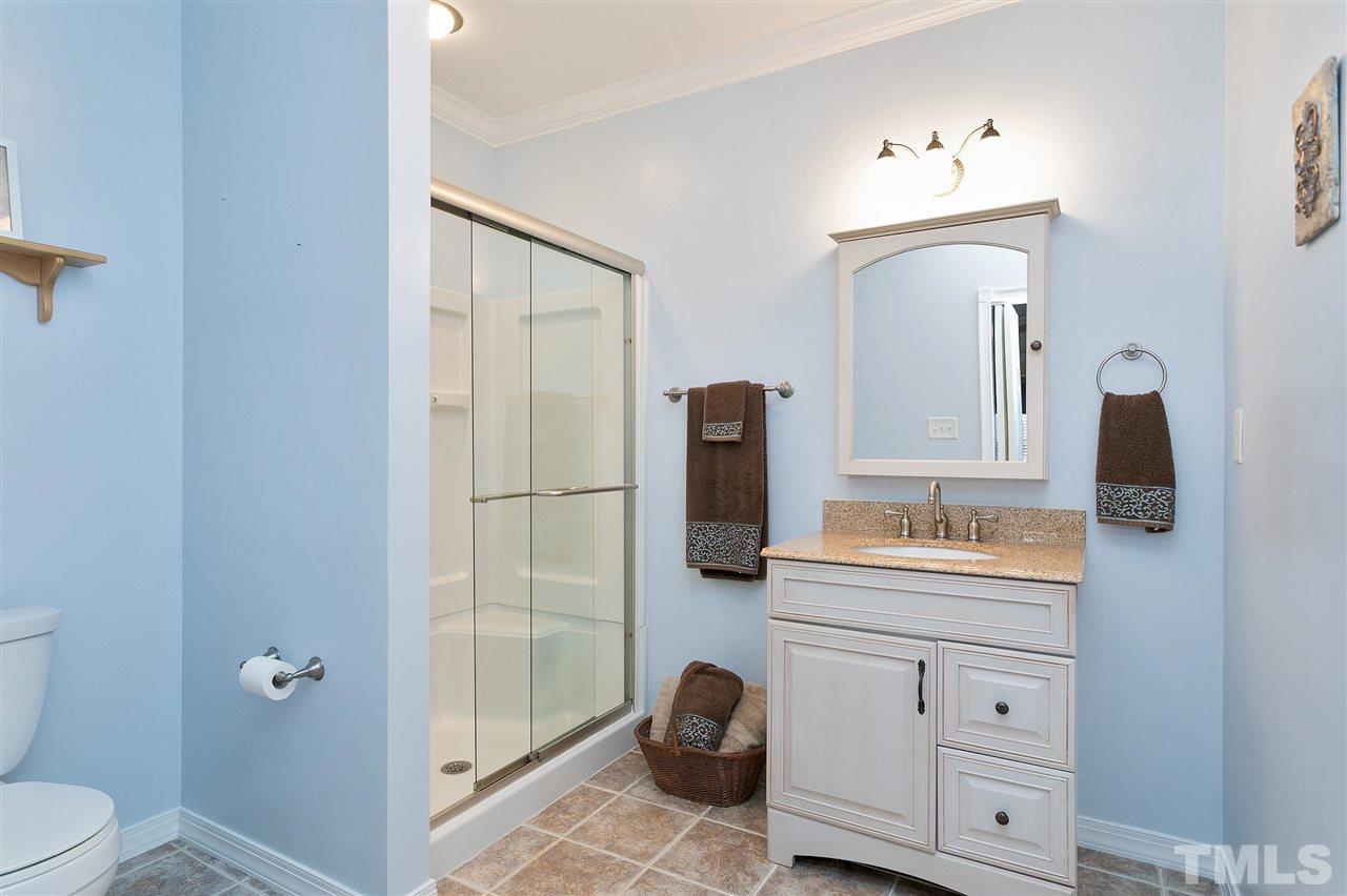 8216 Lloyd Allyns Way Raleigh, NC 27615 - Photo 21 of 30 This home has 4 full baths. This one is in the basement.