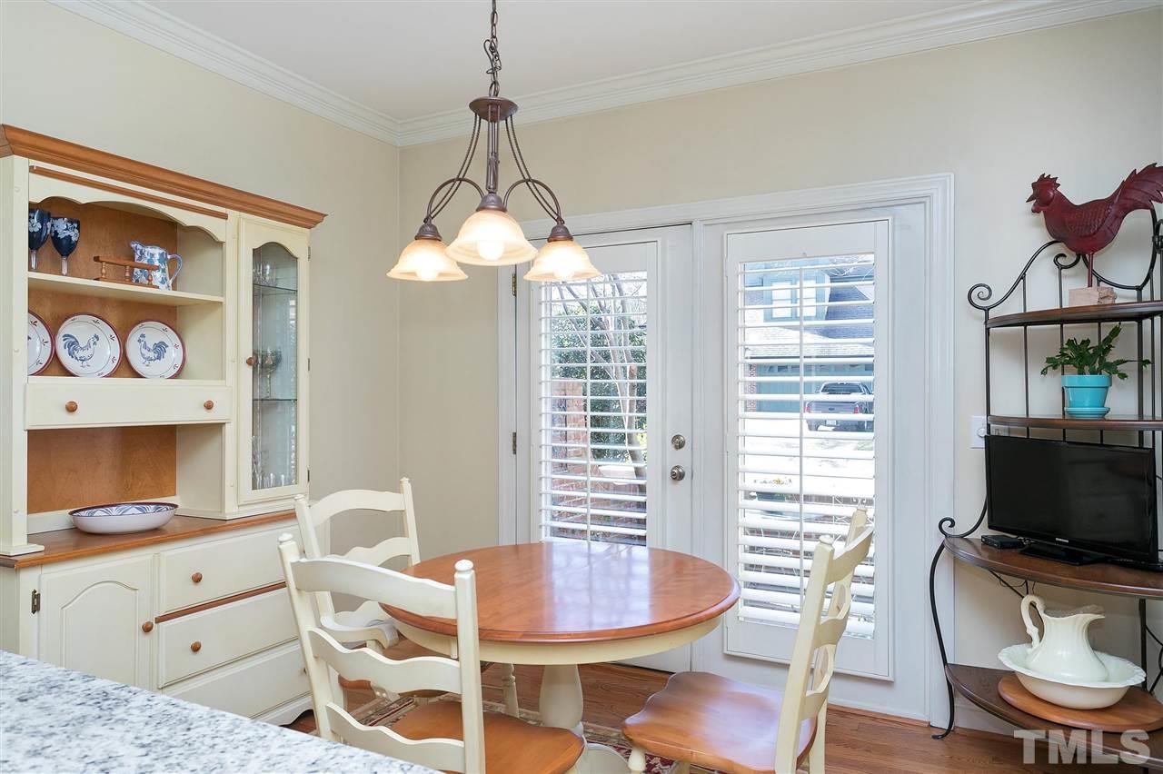 Pretty casual dining area opens onto walled courtyard.