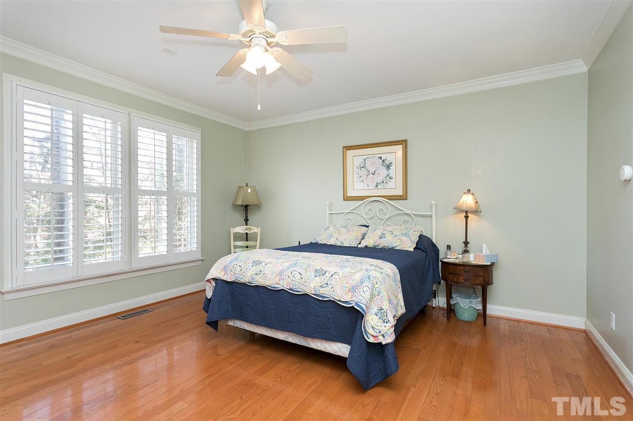 8216 Lloyd Allyns Way Raleigh, NC 27615 - Photo 10 of 30 Hardwood flooring throughout main floor. Nice millwork and plantation shutters.