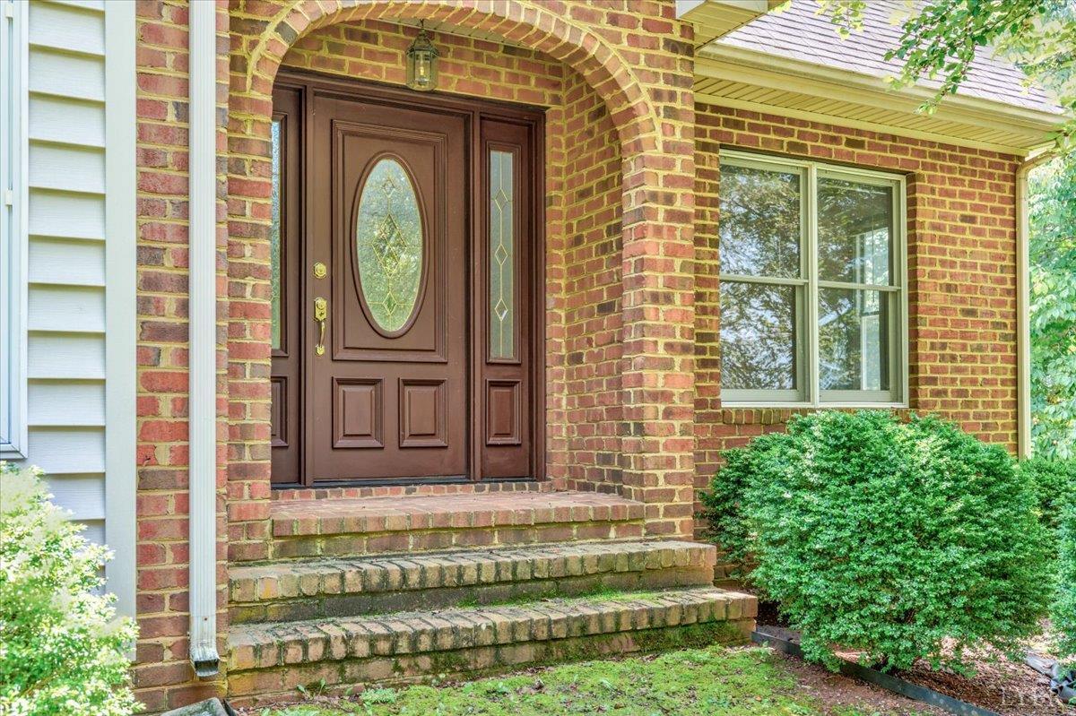 530 Patteson School Road Appomattox, VA 24522 - Photo 3 of 45 a front view of a house with garden