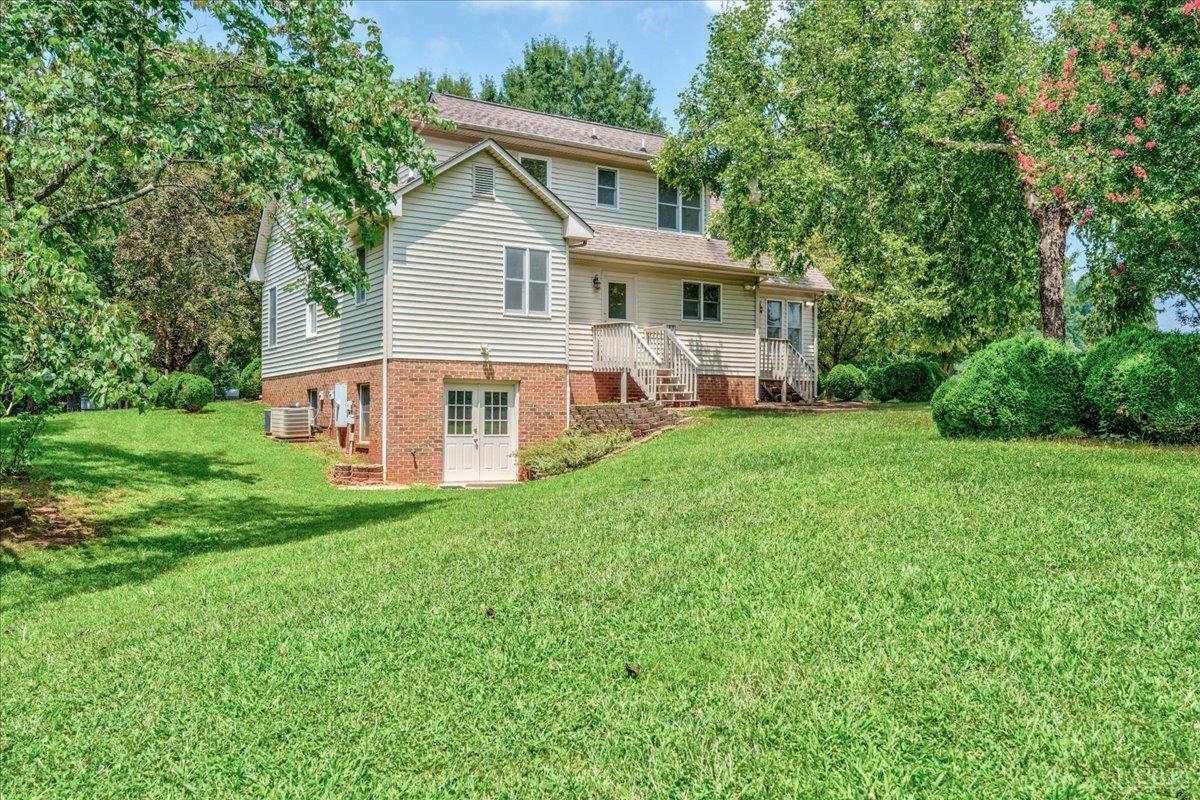 530 Patteson School Road Appomattox, VA 24522 - Photo 35 of 45 a view of a house with a big yard and large trees