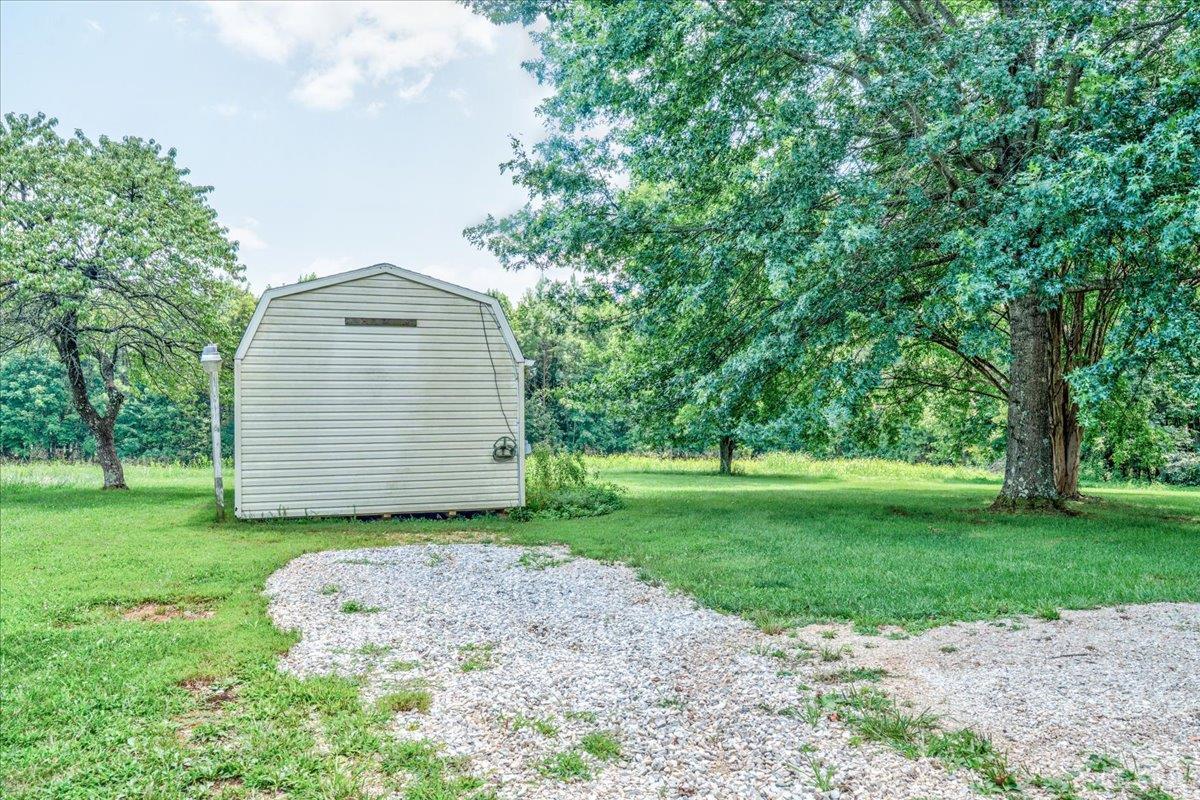 530 Patteson School Road Appomattox, VA 24522 - Photo 39 of 45 a view of a house with a small yard and large trees