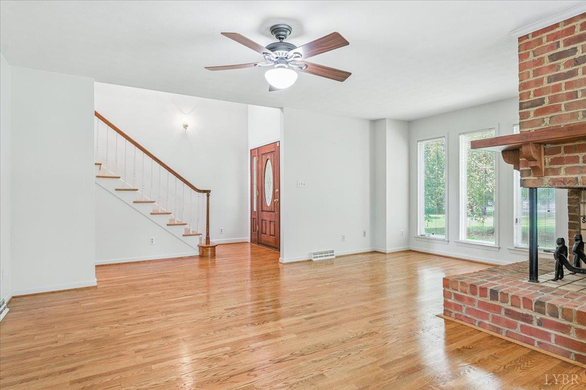 530 Patteson School Road Appomattox, VA 24522 - Photo 7 of 45 a view of an room with wooden floor and white walls