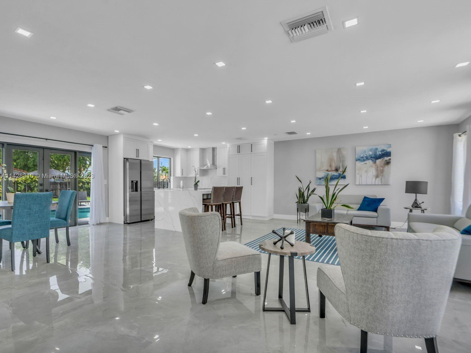 9670 Southwest 17th Street Miami, FL 33165 - Photo 4 of 17 a view of a dining room with furniture window and outside view