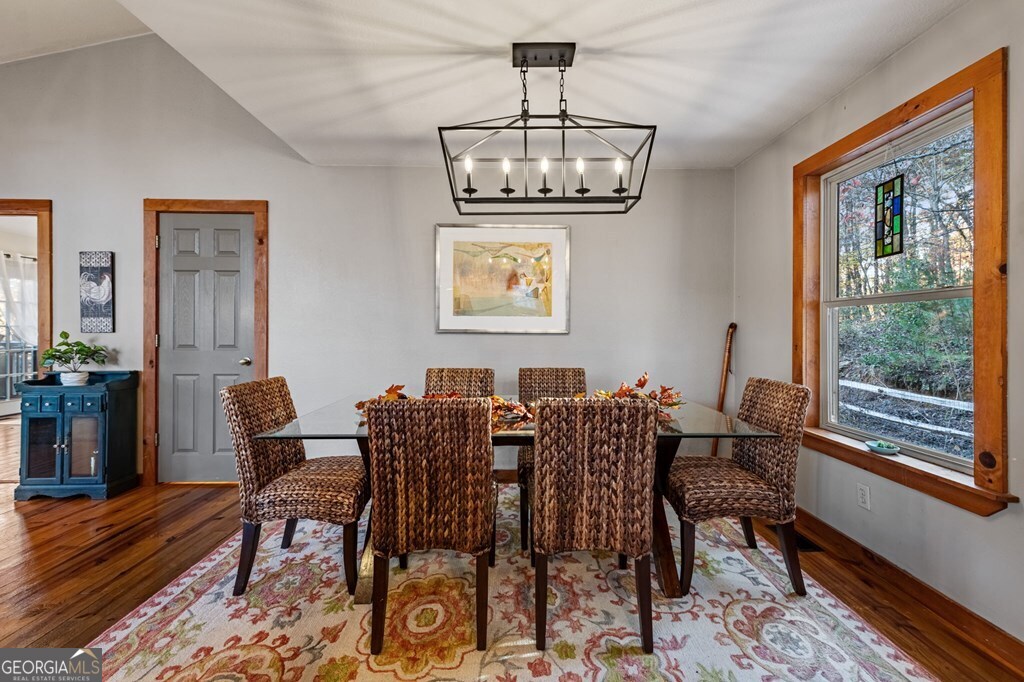 90 Hay Lane Morganton, GA 30560 - Photo 14 of 77 a view of a dining room with furniture window and wooden floor