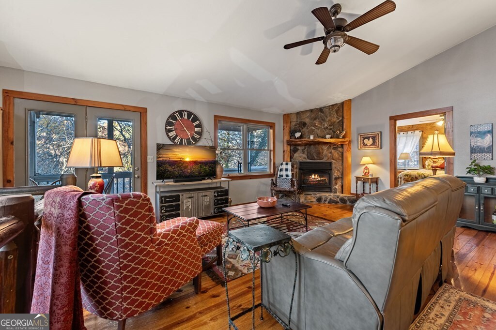 90 Hay Lane Morganton, GA 30560 - Photo 27 of 77 a living room with furniture and a flat screen tv