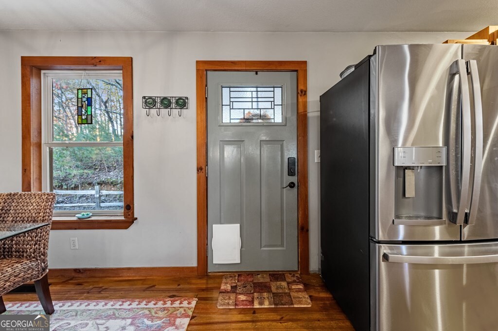 90 Hay Lane Morganton, GA 30560 - Photo 7 of 77 a view of empty room with wooden floor and window