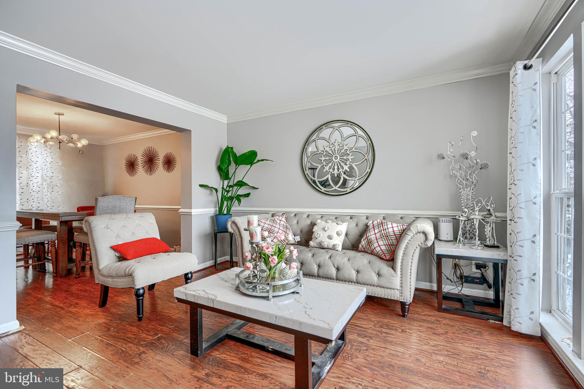8113 Alan Tree Road Rosedale, MD 21237 - Photo 2 of 16 a living room with furniture and wooden floor